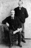 Hugh Montague Henry Mallet (seated) with his secretary.